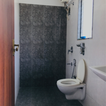Bathroom in Studio Apartment at Esperanca Apartment, Shirgaon – for Sale