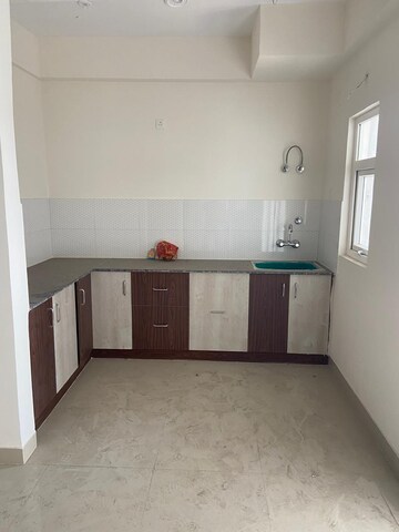 Kitchen in 2 BHK Apartment at Newtech La Palacia, Tech Zone 4 Greater Noida – for Sale