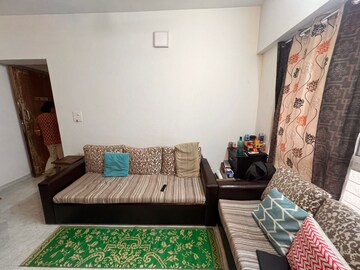 Living Room in 1 BHK Apartment at Lodha Amara, Kolshet Road – for Sale