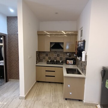 Kitchen in Studio Independent House at Trinity Grand, Aimnabad – for Sale