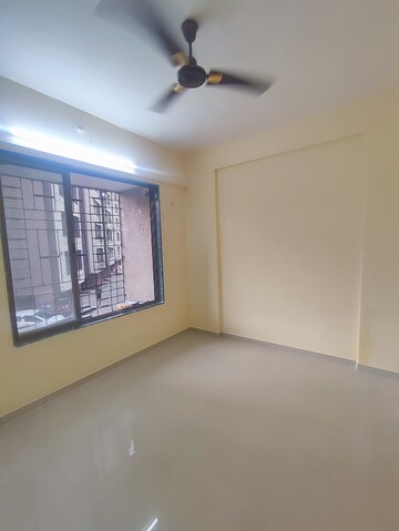 Master Bedroom in 1 BHK Apartment at Kavya Hill View CHS, Anand Nagar – for Sale