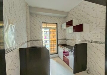 Kitchen in 1 BHK Apartment at Agarwal Solitaire, Virar West – for Sale