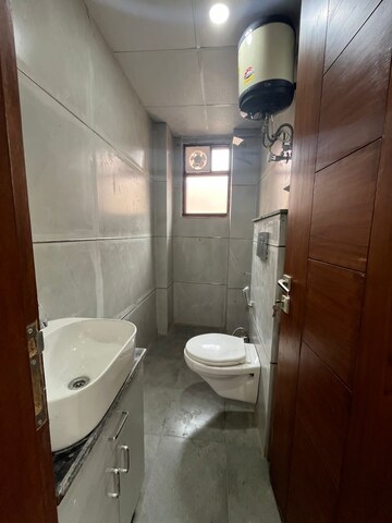 Bathroom in 2 BHK Builder Floor at Chattarpur – for Sale