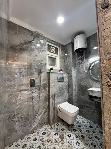 Bathroom in 4 BHK Builder Floor at Chattarpur – for Sale