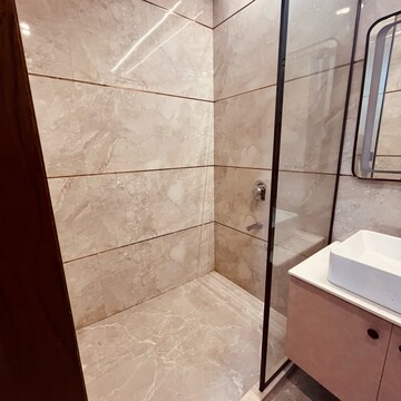 Bathroom in 4 BHK Builder Floor at Ansal API Esencia, Sector 67 – for Sale
