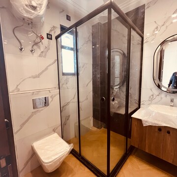 Bathroom in 4 BHK Builder Floor at Ansal API Esencia, Sector 67 – for Sale