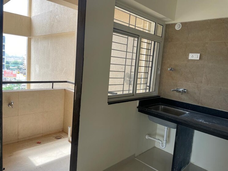 Kitchen, vertical-alcinia 2 Bedroom 724 Sq.Ft. Apartment In Mohammadwadi Pune 7646945