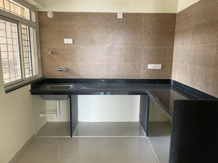 Kitchen, vertical-alcinia 2 Bedroom 724 Sq.Ft. Apartment In Mohammadwadi Pune 7646945