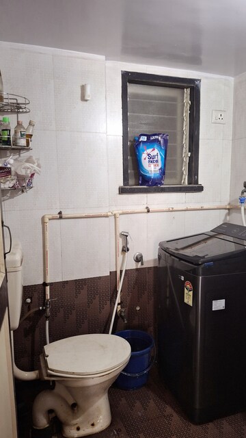 Kitchen in 2 BHK Apartment at Happy Sarvodaya Trilok, Thakurli – for Sale