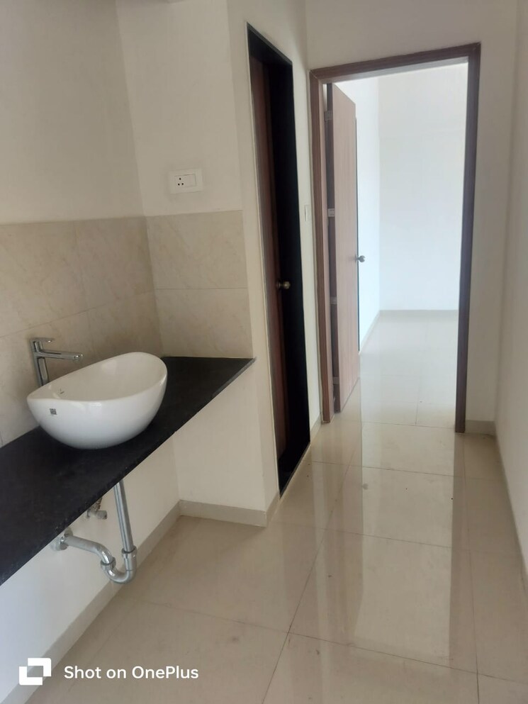 Bathroom, mantra-99-riverfront 3 Bedroom 939 Sq.Ft. Apartment In Baner Pune 7647213