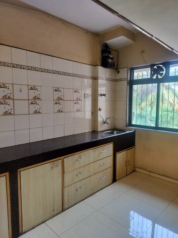 Kitchen in 2 BHK Apartment at Safal Residency, Nerul – for Sale