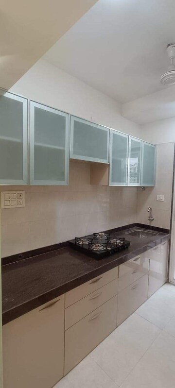 Kitchen in 1 BHK Apartment at Real Emporium, Vasai East – for Sale