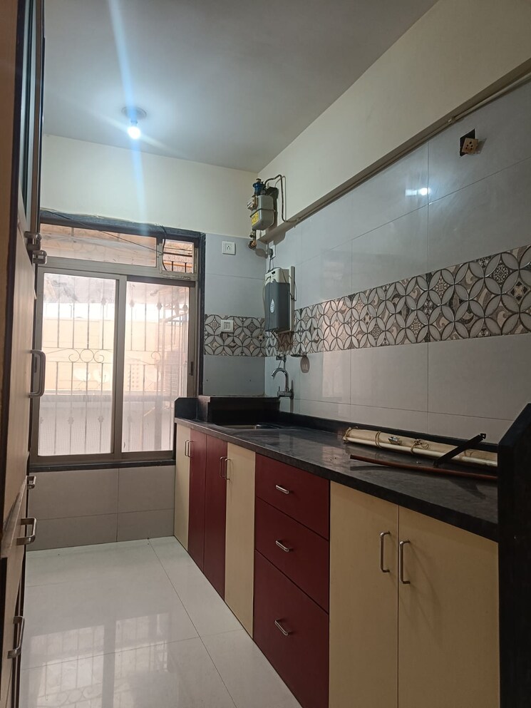 Kitchen, delta-avenue 2 Bedroom 700 Sq.Ft. Apartment In Uthalsar Thane 7648746
