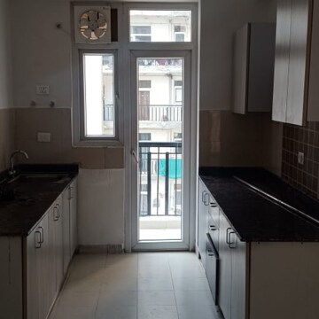 Kitchen in 3 BHK Apartment at Amrapali Zodiac, Sector 120 – for Sale
