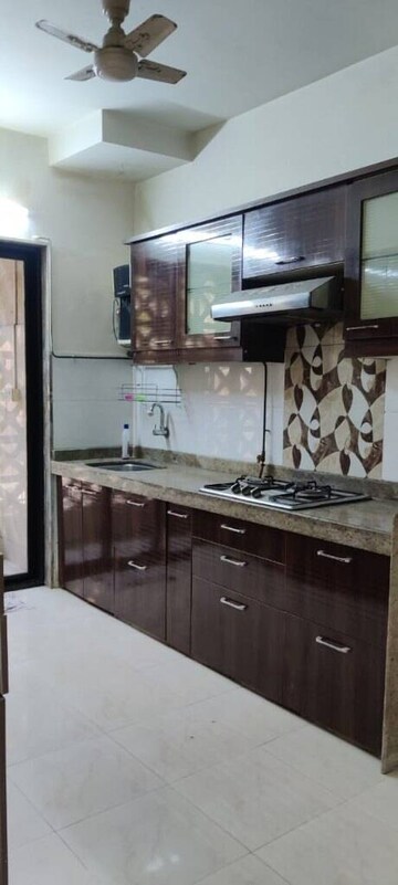 Kitchen in 2 BHK Apartment at Builtron Ambaji Apartment, Mulund West – for Sale