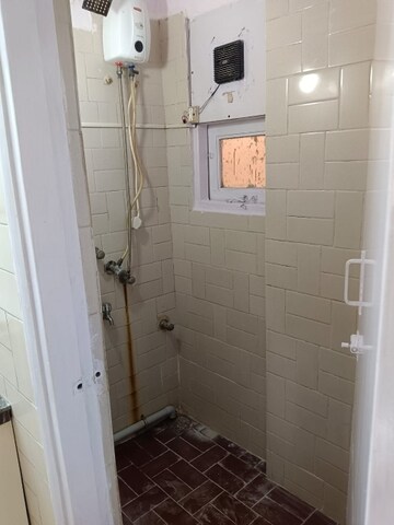 Bathroom in 2 BHK Apartment at Serenity Tower, Andheri West – for Sale