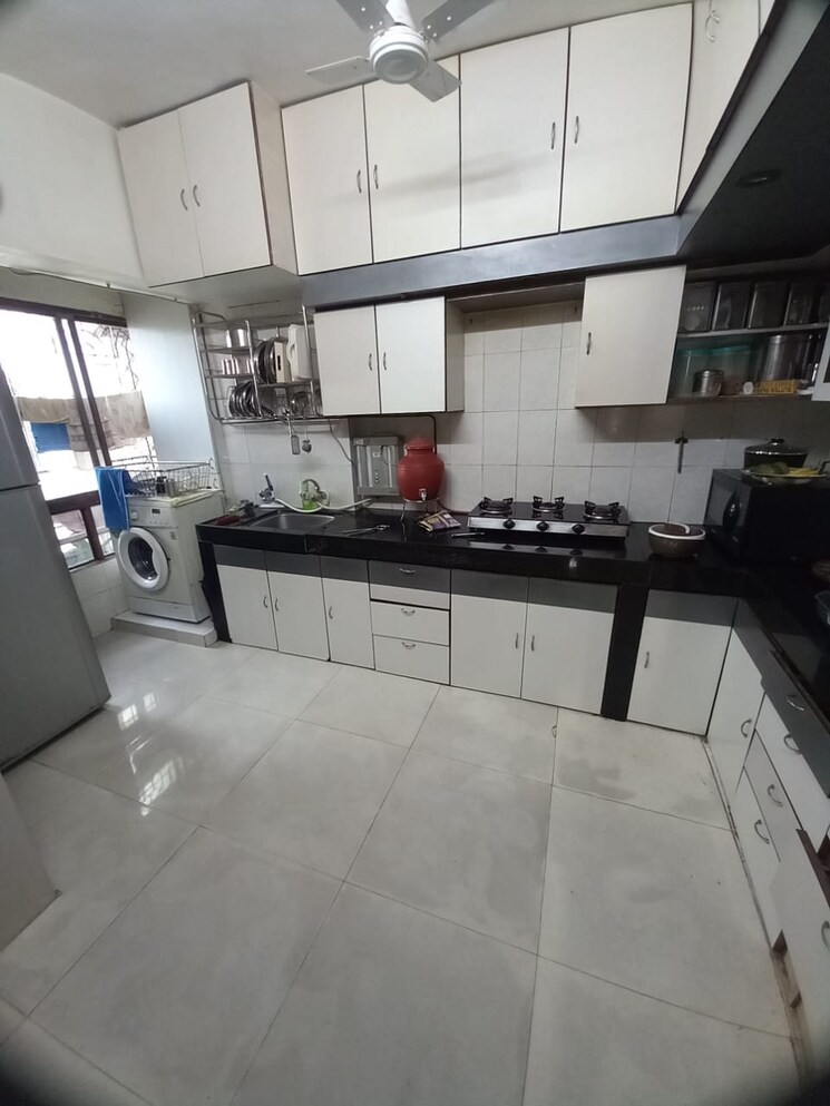 Kitchen, lokhandwala-whispering-palms 2 Bedroom 930 Sq.Ft. Apartment In Kandivali East Mumbai 7651019