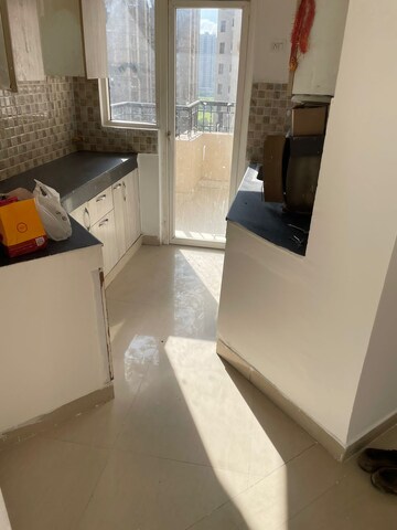 Kitchen in 2 BHK Apartment at Amaatra Homes, Sector 10 Greater Noida – for Sale