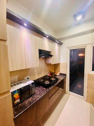 Kitchen in 2 BHK Apartment at Arihant Amber, Sector 1 Greater Noida – for Sale