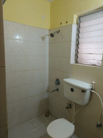 Bathroom in 2 BHK Apartment at Ideal Abasan, Narayanpur – for Sale
