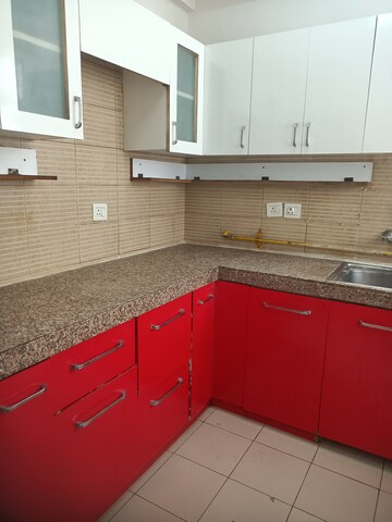 Kitchen in 3 BHK Apartment at 3C Lotus Boulevard, Sector 100 – for Rent
