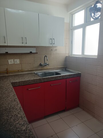 Kitchen in 3 BHK Apartment at 3C Lotus Boulevard, Sector 100 – for Rent