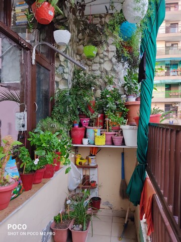 Balcony in 1.5 BHK Apartment at Dhakoli Village – for Sale