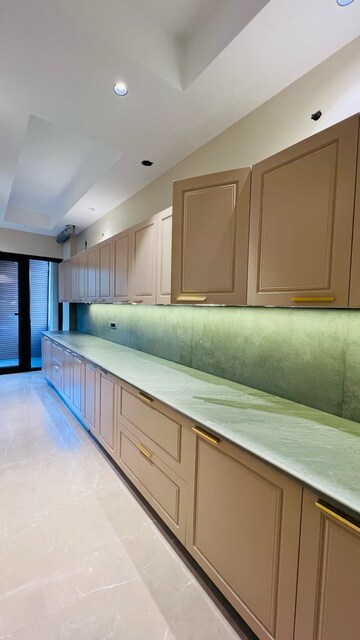 Kitchen in 4 BHK Builder Floor at Devindar Vihar, Sector 56 – for Sale