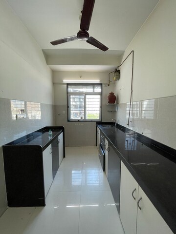 Kitchen in 1 BHK Apartment at Sheth Midori, Dahisar East – for Sale