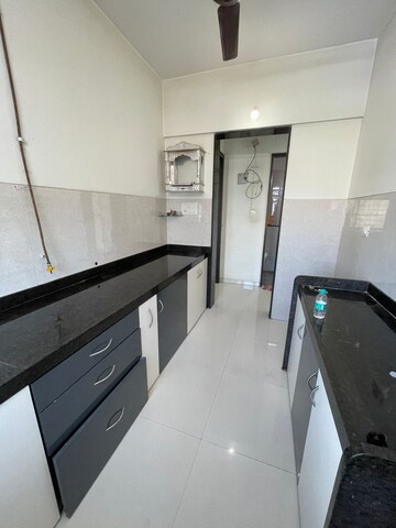 Kitchen in 1 BHK Apartment at Sheth Midori, Dahisar East – for Sale