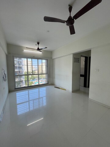 Living Room in 1 BHK Apartment at Sheth Midori, Dahisar East – for Sale