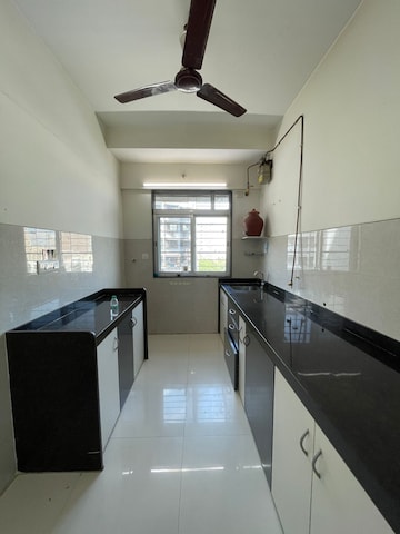 Kitchen in 1 BHK Apartment at Sheth Midori, Dahisar East – for Sale