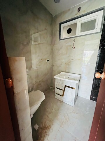 Bathroom in 4 BHK Builder Floor at Ansal Api Versalia 2, Sector 67a – for Sale
