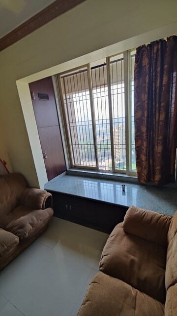 Living Room in 2 BHK Apartment at Dombivli East – for Sale