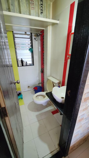 Bathroom in 2 BHK Apartment at Dombivli East – for Sale
