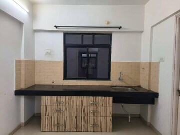 Kitchen in 2 BHK Apartment at Neco Gardens, Viman Nagar – for Sale