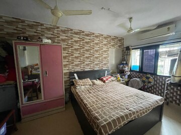 Bedroom in 1 BHK Apartment at Raj Shivam Society, Dahisar East – for Sale