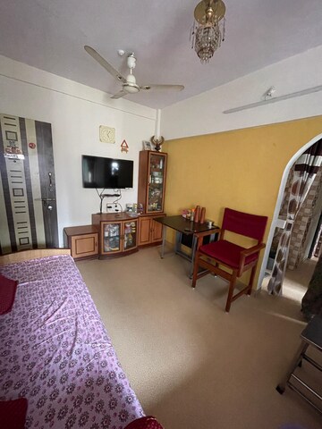 Living Room in 1 BHK Apartment at Raj Shivam Society, Dahisar East – for Sale