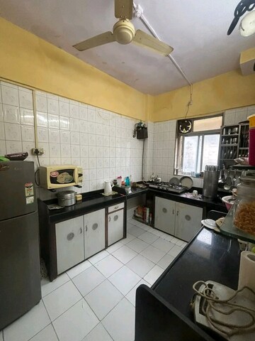 Kitchen in 2 BHK Apartment at Angelica Heights, Nalasopara West – for Sale