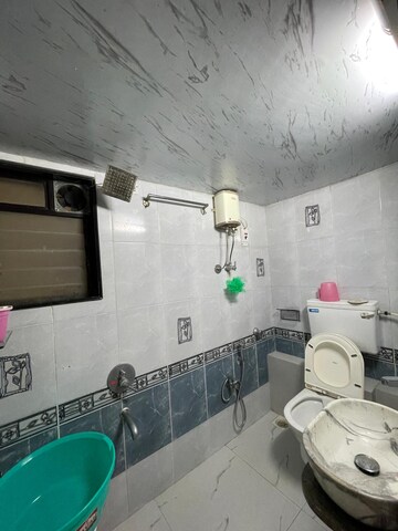 Bathroom in 1 BHK Apartment at Raj Shivam Society, Dahisar East – for Sale