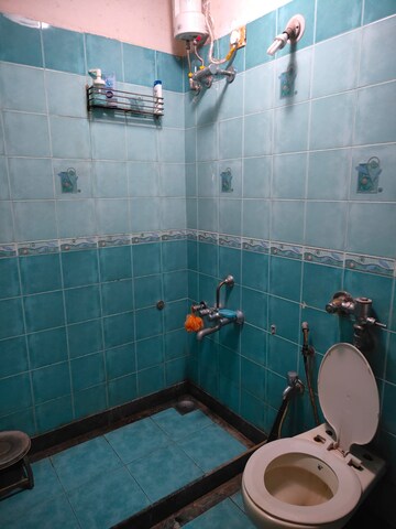 Bathroom in 2 BHK Apartment at Manavsthal Heights, Andheri East – for Sale
