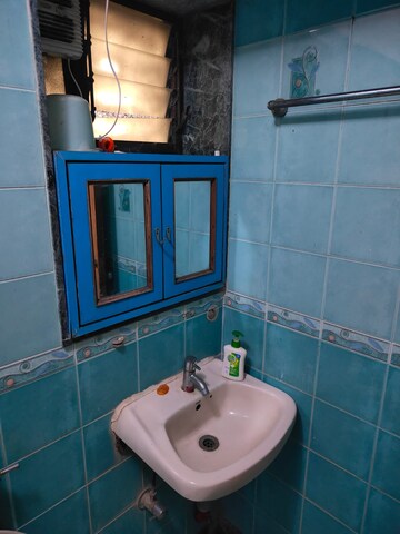 Bathroom in 2 BHK Apartment at Manavsthal Heights, Andheri East – for Sale