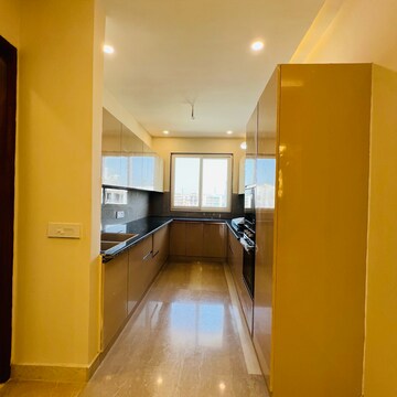 Kitchen in 4 BHK Builder Floor at Ansal API Esencia, Sector 67 – for Sale