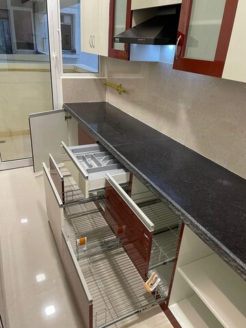 Kitchen in 2.5 BHK Apartment at Mahagun Mirabella, Sector 79 – for Sale