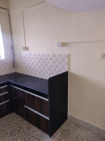 Kitchen in 2 BHK Apartment at Nalanda CHS, Vashi Sector 17 – for Sale