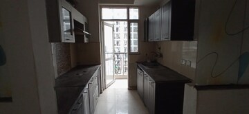 Kitchen in 3 BHK Apartment at Amrapali Silicon City, Sector 76 – for Sale