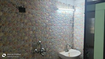 Bathroom in 2 BHK Apartment at Amrapali Silicon City, Sector 76 – for Sale
