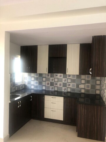 Kitchen in 2 BHK Apartment at Amrapali Silicon City, Sector 76 – for Sale