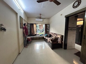 Living Room in 1 BHK Apartment at Datta Krupa CHS, Dahisar East – for Sale