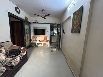 Living Room in 1 BHK Apartment at Datta Krupa CHS, Dahisar East – for Sale
